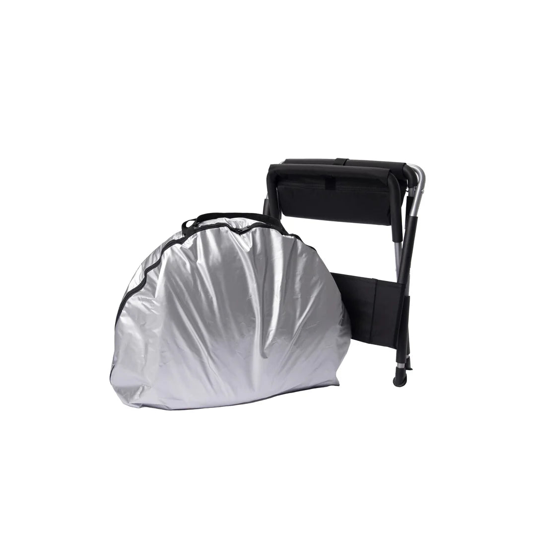 Relax Black Pro Far Infrared silver carrying case and a black folding chair against a white background