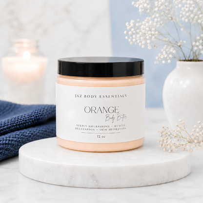 Orange Magnesium Body Butter in premium packaging formulated with organic and natural ingredients for deep skin hydration. Blu Onyx
