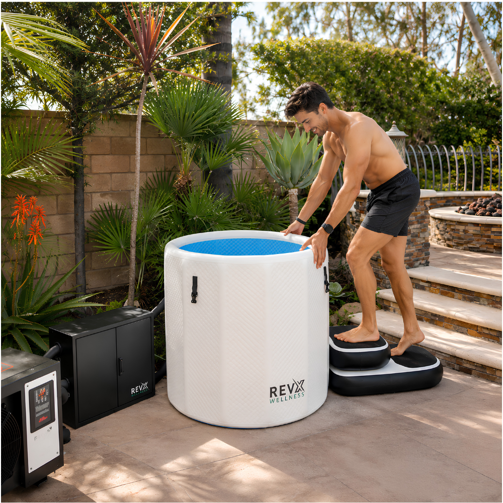 Portable RevX cold plunge tub set up outdoors for cold water recovery therapy. Complete RevX inflatable cold plunge kit including tub, lid, steps and pump.