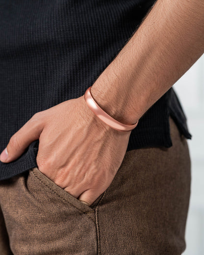 Person wearing a copper bracelet by TheraCopper on Blu Onyx