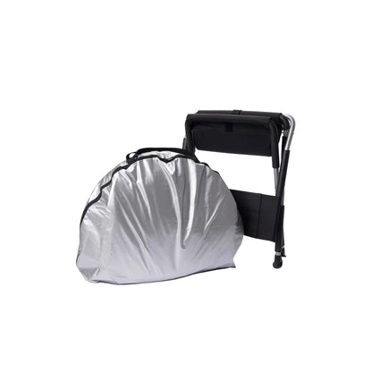 Relax Black Pro Far Infrared silver carrying case and a black folding chair against a white background